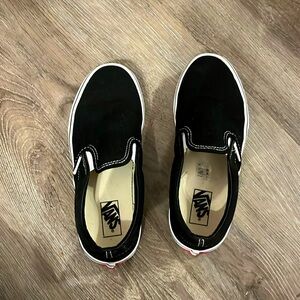 Kids size 3 slip on black vans; slightly worn